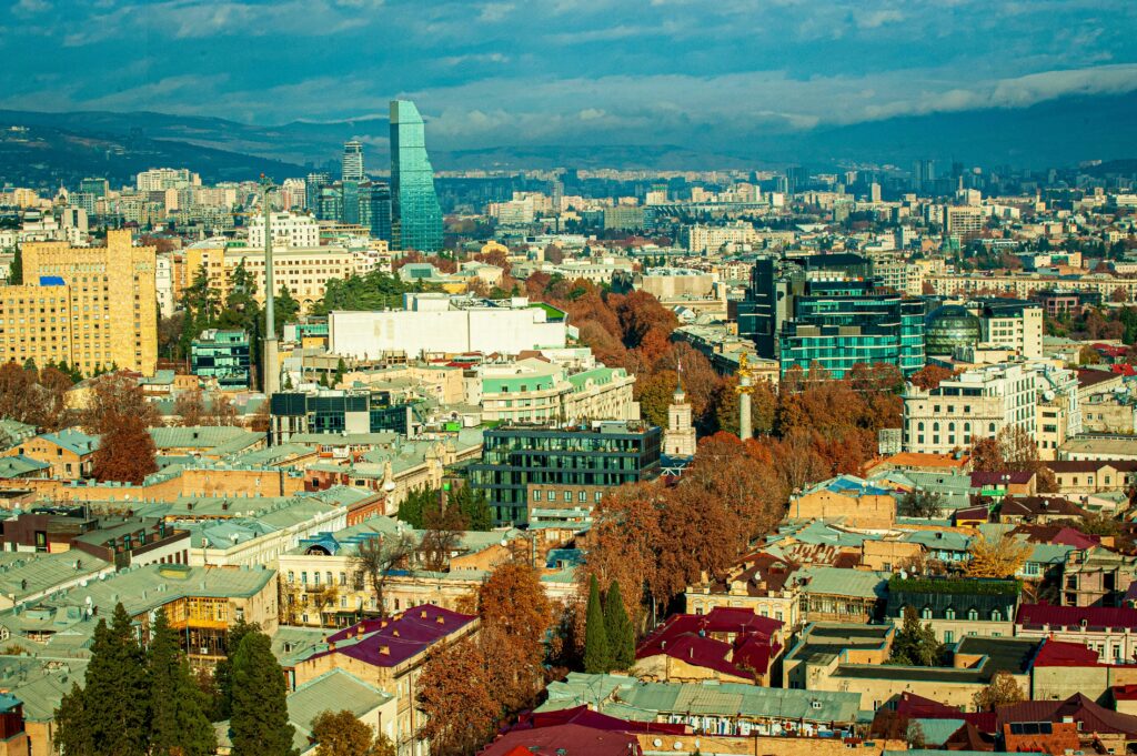 Captivating aerial shot of Tbilisi, Georgia, showcasing modern and historic architecture.